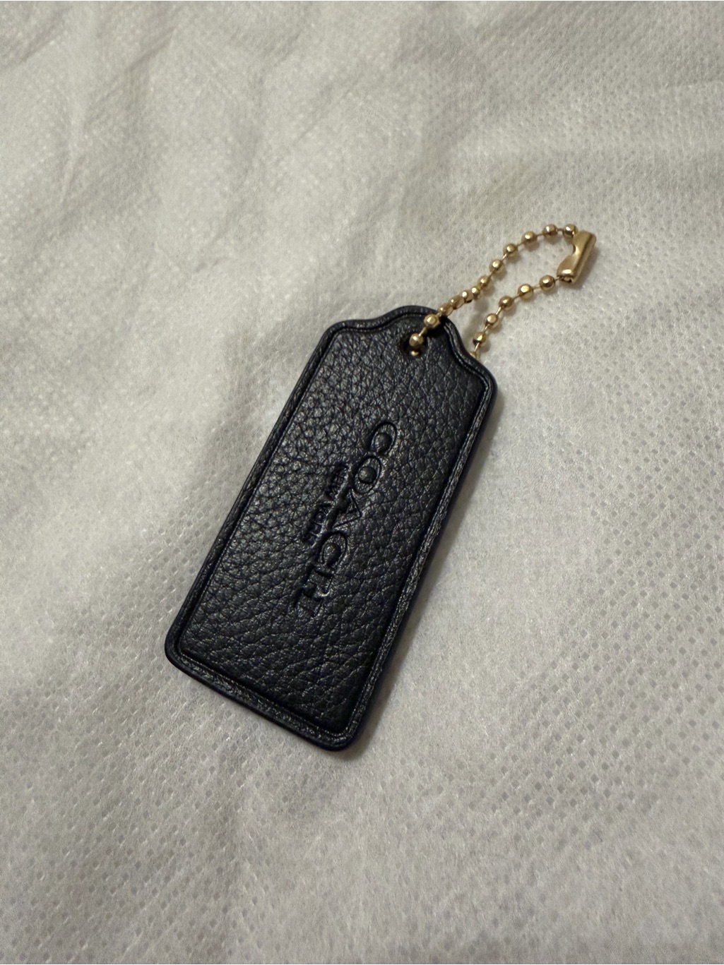Coach Hang Tag